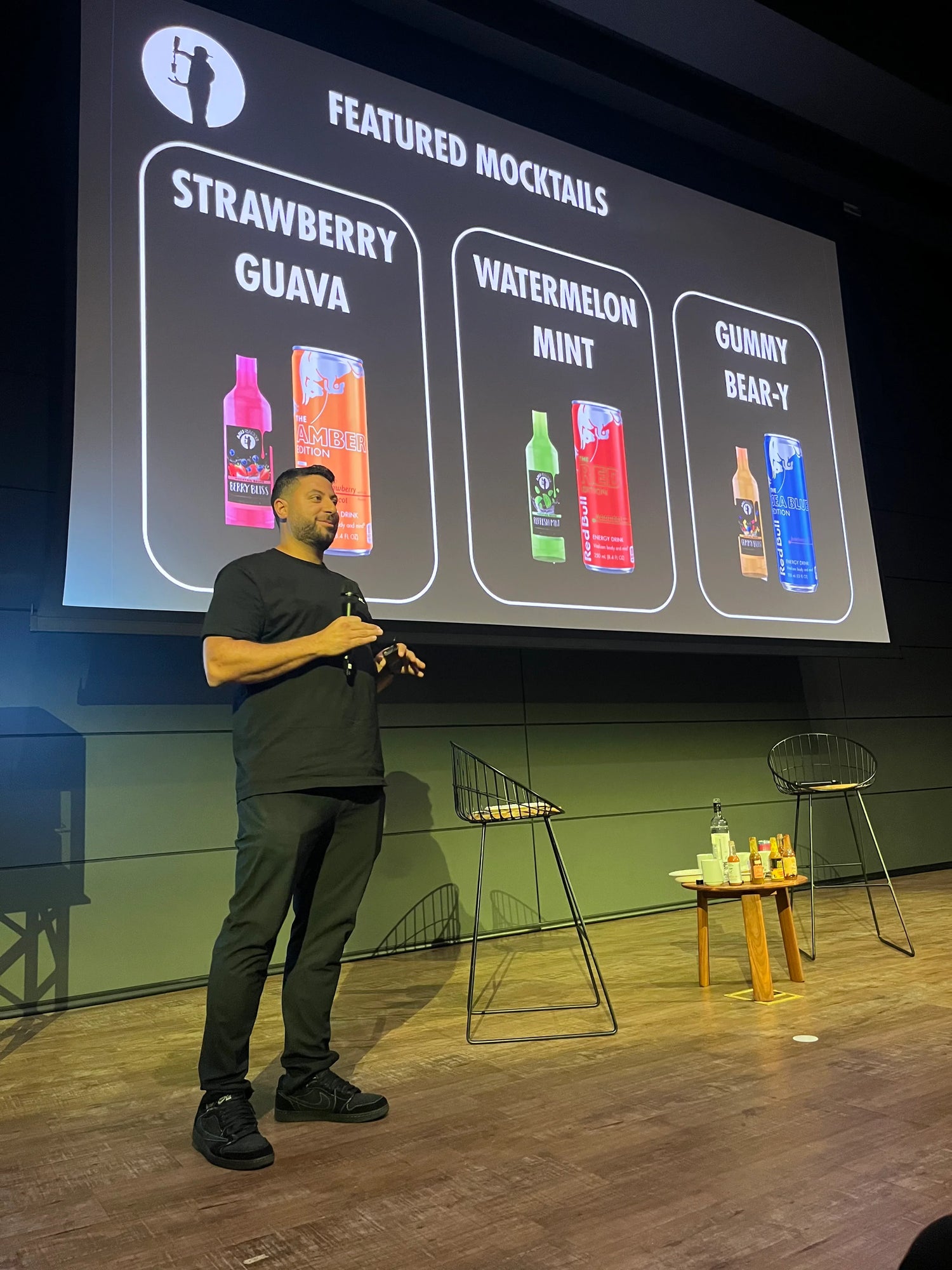 Abu Sauce founder pouring a halal gourmet mocktail at a private event